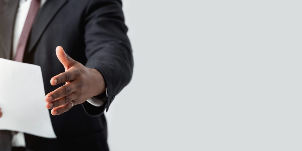 Business Background, Wide Banner With Unrecognizable Businessman Giving Hand For Handshake, Cropped Shot Of Man In Suit Offering Partnership, Long Extended Shot, Panorama With Copy Space
